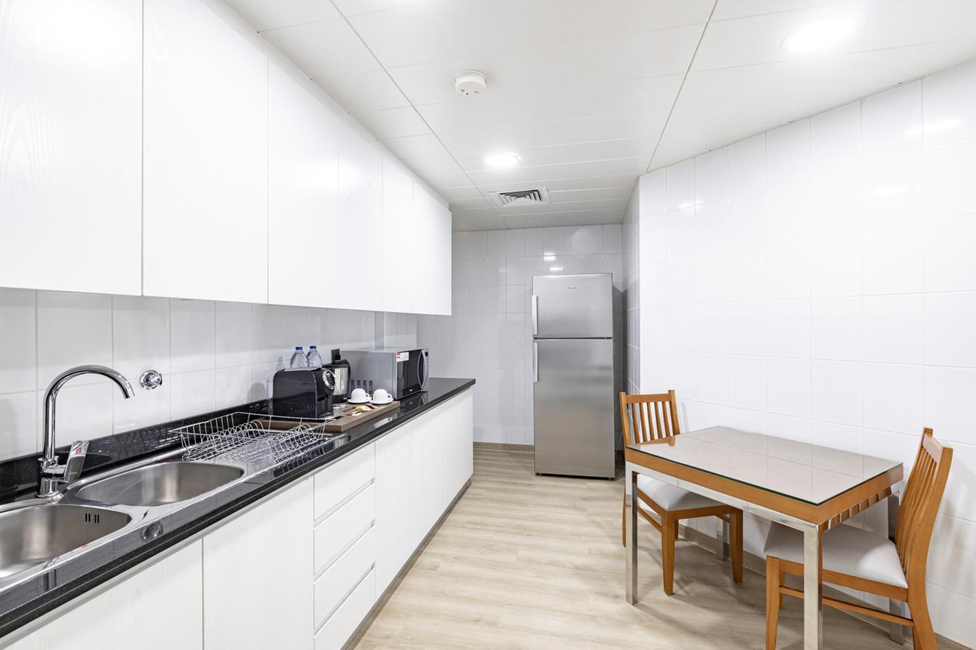 Golden Sands Suites Dubai Phòng bức ảnh